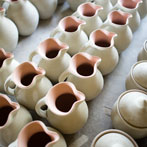 Svend Bayer loading his small kiln 2016